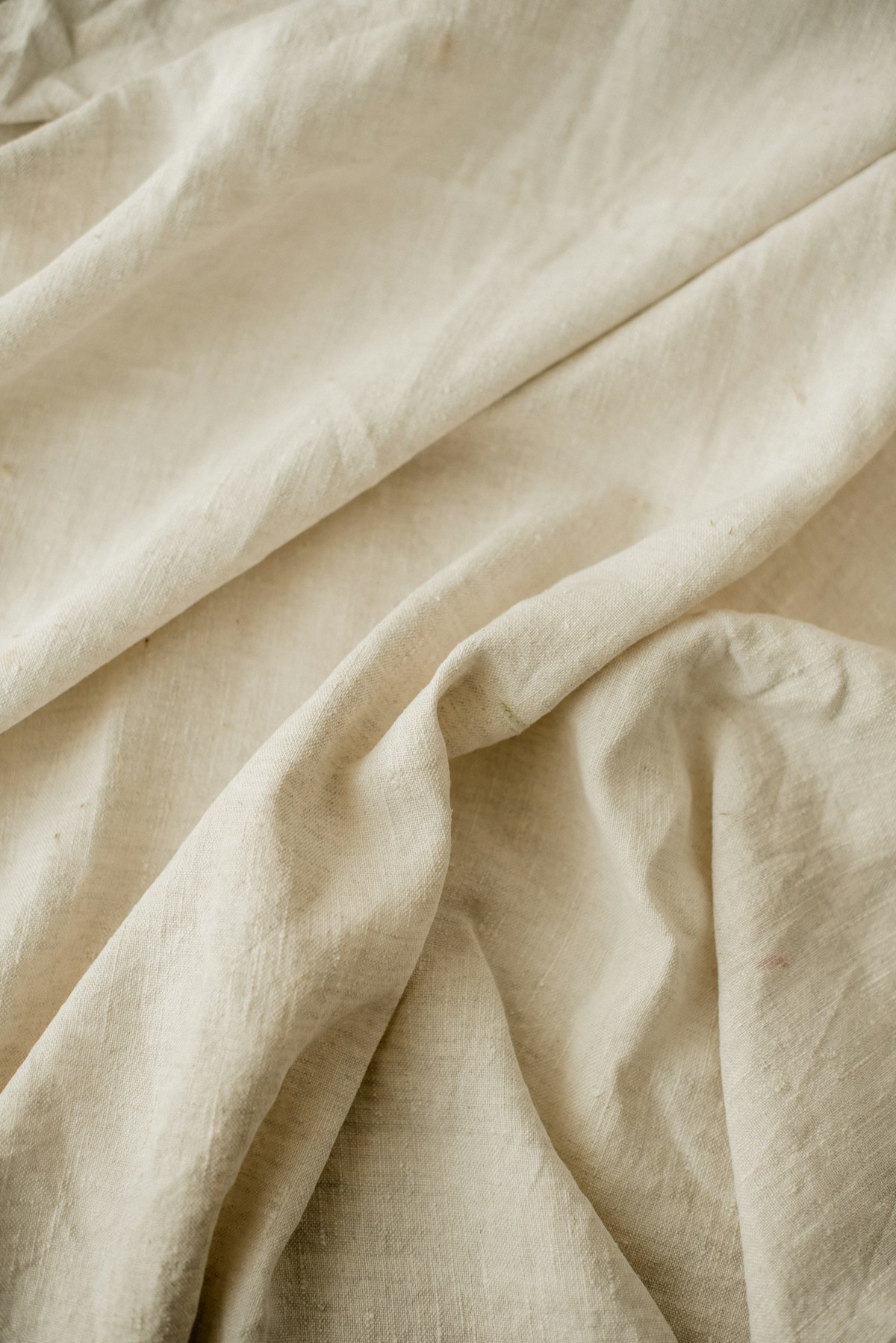 Softly creased oatmeal linen throw, detail of the weave