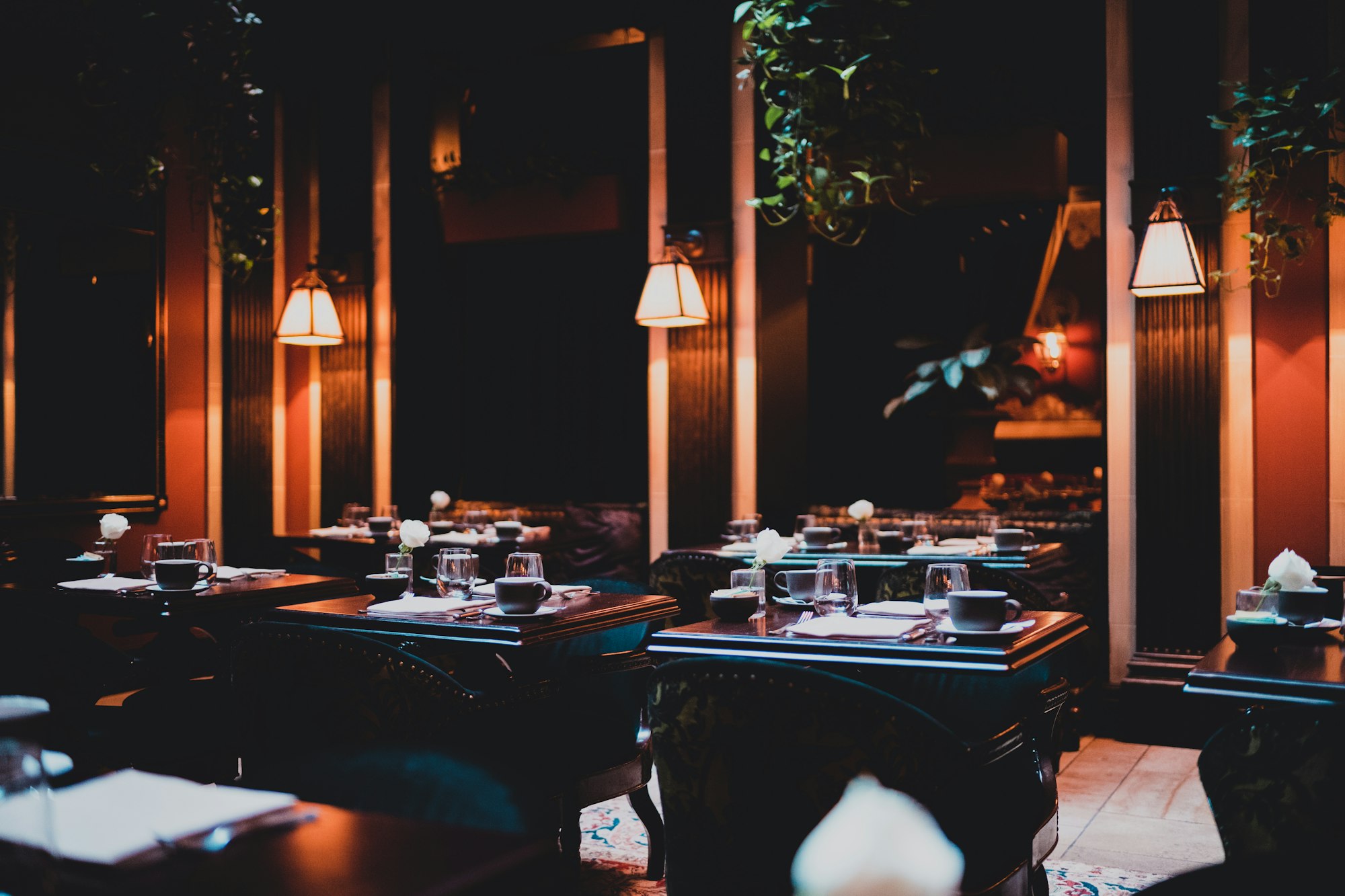 The candlelit dining room at Sable & Vine